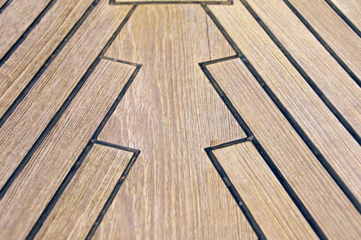 Yacht teak on sailing yacht with yacht caulking